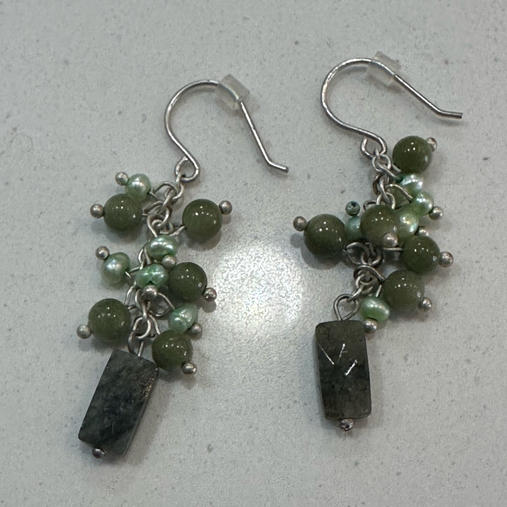 Silver and green stone festive drop down earrings